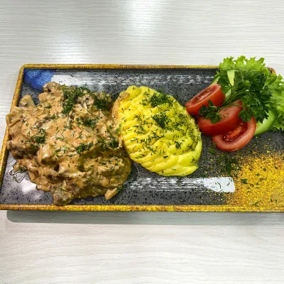 Телятина с грибами